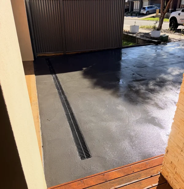 Close view of the dark charcoal concrete finish at Blakeview